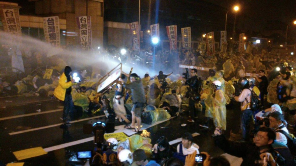 Police use water cannons on anti-nuclear protestors conducting a die-in in Taiwan in April. The protests led to suspension of construction of Taiwan's fourth nuclear reactor.