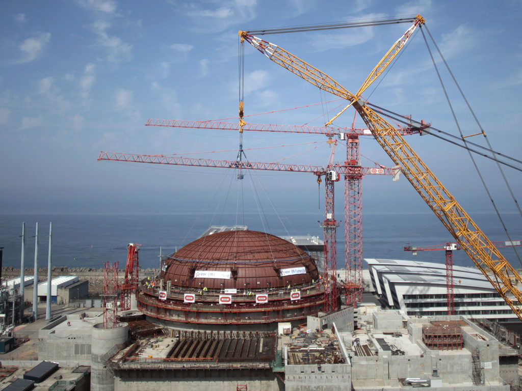 France's Flamanville reactor is well over-budget and behind schedule. When complete, EDF will have to close its Fessenheim reactor if it wants to operate Flamanville.